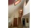 Grand foyer with soaring ceilings, staircase, and ample natural light at 11600 E Adriatic Pl, Aurora, CO 80014