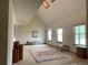 Spacious living area featuring high ceilings, skylights, and natural light at 11600 E Adriatic Pl, Aurora, CO 80014