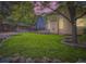 Expansive backyard featuring a lush lawn, patio area, and charming landscaping perfect for outdoor enjoyment at 16200 Hedgeway Dr, Parker, CO 80134