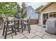 Backyard patio featuring stylish outdoor furniture, providing a perfect space for relaxation and outdoor dining at 16200 Hedgeway Dr, Parker, CO 80134