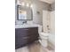 Updated bathroom featuring a double vanity with drawers, and shower-tub combo at 16200 Hedgeway Dr, Parker, CO 80134