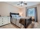 Bedroom boasting natural light and a well-appointed dresser at 16200 Hedgeway Dr, Parker, CO 80134