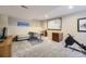 Finished basement offers ample space for recreation, fitness and includes a workspace area at 1153 Berganot Trl, Castle Pines, CO 80108