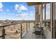 Relax on this condo's balcony with seating and city views at 5455 Landmark Pl # 1103, Greenwood Village, CO 80111