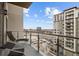 Spacious balcony with seating offers city views at 5455 Landmark Pl # 1103, Greenwood Village, CO 80111