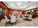 Elegant dining area featuring a kitchenette, multiple tables, and sophisticated decor at 5455 Landmark Pl # 1103, Greenwood Village, CO 80111