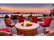 Community fire pit with comfortable seating and mountain views at 5455 Landmark Pl # 1103, Greenwood Village, CO 80111