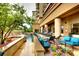 Resort style community pool with lounge chairs and landscaping at 5455 Landmark Pl # 1103, Greenwood Village, CO 80111