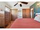 Relaxing bedroom with hardwood floors, natural light, and ample closet space at 4833 S Elati St, Englewood, CO 80110