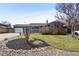 Charming home with well-manicured lawn, mature landscaping, and a welcoming front exterior at 4833 S Elati St, Englewood, CO 80110