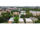 Panoramic aerial view of the neighborhood with a lush tree canopy, showcasing the vibrant city at 1182 Clermont St # 201, Denver, CO 80220