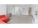 A bonus room sits at the top of the stairs with a view into the bedrooms and bathroom at 601 Morrison Dr, Frederick, CO 80530