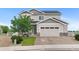 Charming two-story home with neutral siding, stone accents, an attached two car garage, and well manicured yard at 601 Morrison Dr, Frederick, CO 80530