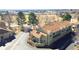 Aerial view of well-maintained townhomes in a desirable community and green spaces at 7373 E Iowa Ave # 1108, Denver, CO 80231