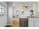 Open concept kitchen view showing stainless steel appliances, and access to other living spaces at 7373 E Iowa Ave # 1108, Denver, CO 80231