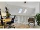 Bright loft with skylights, offering a versatile space for work or relaxation at 7373 E Iowa Ave # 1108, Denver, CO 80231