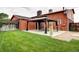 Inviting backyard with patio under gazebo, great for outdoor living and entertaining at 7300 Beech St, Arvada, CO 80005
