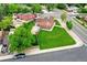 Aerial view of house with spacious backyard with a well manicured lawn at 7300 Beech St, Arvada, CO 80005