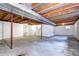 Open basement area with exposed beams and ductwork offering customization potential at 7300 Beech St, Arvada, CO 80005