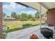 Backyard view featuring patio, a lush lawn, garden beds, and privacy fence at 4715 Garland St, Wheat Ridge, CO 80033