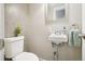 Cozy bathroom with toilet and sink boasting modern fixtures and fresh decor at 4715 Garland St, Wheat Ridge, CO 80033