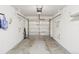 Spacious garage interior featuring storage and overhead lighting at 4715 Garland St, Wheat Ridge, CO 80033