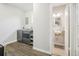 Laundry room and bathroom with gray washer and dryer and updated sink at 4715 Garland St, Wheat Ridge, CO 80033