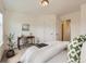 Bedroom featuring neutral carpet, lots of natural light, and a desk with an office chair at 2507 Moline St, Aurora, CO 80010