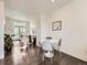 Open-concept dining area with stylish decor and hardwood flooring at 2507 Moline St, Aurora, CO 80010