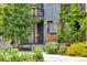 Charming home entrance with a lush garden and stylish architectural details at 2507 Moline St, Aurora, CO 80010