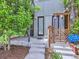 Cozy front porch with decorative lattice and clear address numbers at 2507 Moline St, Aurora, CO 80010