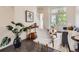 Stylish living area with hardwood floors, modern decor, and lots of natural light at 2507 Moline St, Aurora, CO 80010