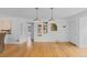 Open dining room with wood floors at 3209 E Yale Way, Denver, CO 80210