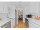 Bright modern kitchen with updated appliances and fixtures at 3209 E Yale Way, Denver, CO 80210