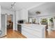 Clean, modern kitchen with white cabinets and stainless appliances at 3209 E Yale Way, Denver, CO 80210