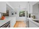 Bright kitchen with stainless steel appliances and modern decor at 3209 E Yale Way, Denver, CO 80210