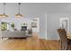 Bright living room with fireplace and wood floors at 3209 E Yale Way, Denver, CO 80210