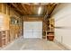 Spacious garage with workbench and storage shelves at 11917 Lavinia Way, Northglenn, CO 80233