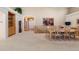 Open-concept dining room with a view of the entrance hallway and staircase, and the kitchen at 17 Canon Dr, Greenwood Village, CO 80111