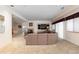 Living room offering plush carpeting, a fireplace, media center, and views of the upper and lower levels at 17 Canon Dr, Greenwood Village, CO 80111