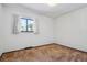 Bedroom featuring a window with curtains, and neutral paint at 4192 S Vrain St, Denver, CO 80236