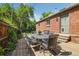 Charming backyard patio with dining area, perfect for outdoor entertaining at 7350 W 21St Ave, Lakewood, CO 80214