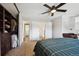 Spacious bedroom featuring closet, doorway and writing desk at 7705 W 87Th Dr, Arvada, CO 80005