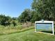 Sign marking the entrance to Nottingham Park in Westminster, surrounded by lush greenery at 7705 W 87Th Dr, Arvada, CO 80005