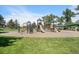 Community playground with slides and climbing structures, perfect for Gathering fun and recreation at 7705 W 87Th Dr, Arvada, CO 80005