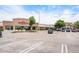 Shopping center featuring a variety of stores with ample parking and appealing facades at 7705 W 87Th Dr, Arvada, CO 80005