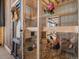 Chicken coop featuring a secure enclosure with roosting areas and a wire mesh exterior at 12160 Spring Creek Rd, Parker, CO 80138