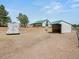 Exterior view of a barn with an outbuilding, providing ample storage and workspace at 12160 Spring Creek Rd, Parker, CO 80138