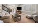 Comfortable carpeted living room featuring a large window at 12160 Spring Creek Rd, Parker, CO 80138