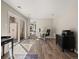 Spacious office with wood floors, a desk, and a sliding door to the outdoors at 12160 Spring Creek Rd, Parker, CO 80138